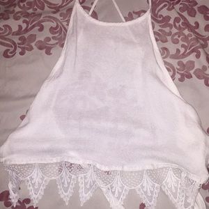 White Halted Top with an open back.